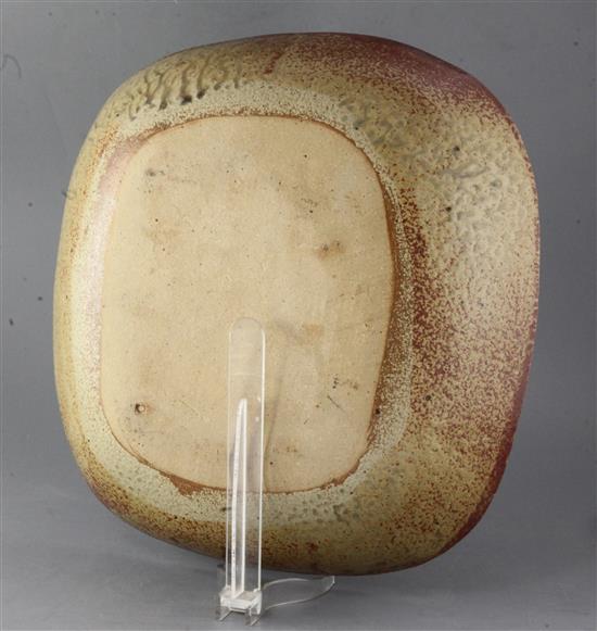 Pierre Culot (Belgian 1938-2011). A red/brown-glazed large stoneware dish, diameter 41cm